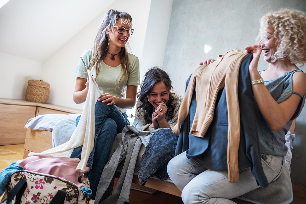 share-clothes A group of friends sharing clothes